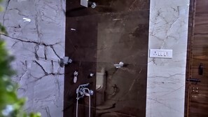 Dutxa, tovalloles, sabó i xampú 