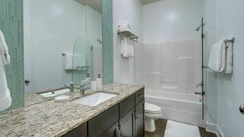 Combined shower/bathtub, hair dryer, towels, shampoo