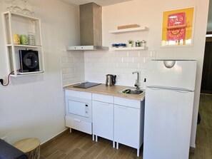 Fridge, microwave, coffee/tea maker, toaster