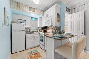 Fridge, microwave, oven, stovetop - Beachfront Resort Suite With Heated Pool - Tropic Terrace Resort #12 (Treasure Island)