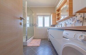 Chuveiro, secador de cabelo