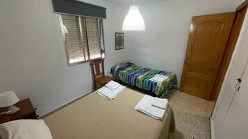 3 dormitorios, tabla de planchar con plancha, wifi