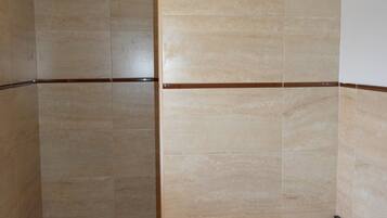 Shower, rainfall showerhead, towels