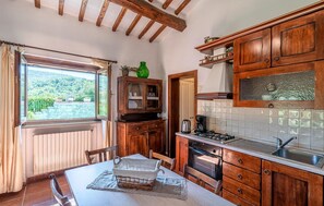 Fridge, stovetop, coffee/tea maker