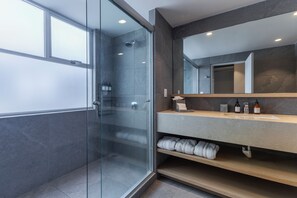 Bathtub, hair dryer, towels, soap