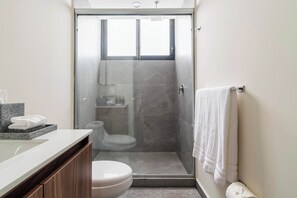 Shower, hair dryer, towels, soap