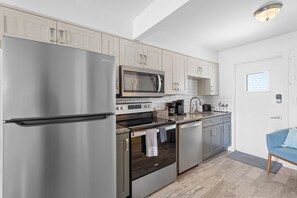 Fridge, microwave, oven, dishwasher - Deluxe King Suite w/Deck (Saint James City)