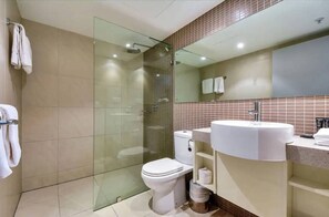 Shower, hair dryer, towels, soap