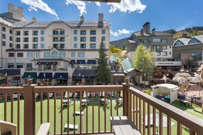 A hotel courtyard with outdoor seating, a pool, and a view of surrounding buildings. - Charlie's Slopeside: Luxury Ski-In/Out, BC Village, Sleeps 8, 3 King Beds, AC, Walk to Everything (Beaver Creek)