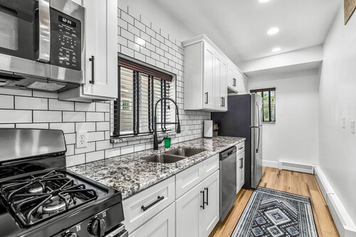 Walk to downtown Holly from this newly renovated historic apartment!