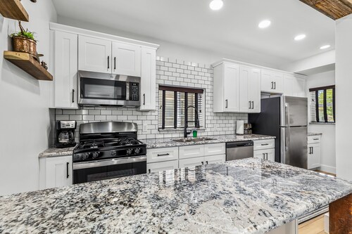 Walk to downtown Holly from this newly renovated historic apartment!