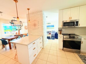 Fridge, microwave, oven, stovetop - Casa Azul, Key Largo, Home w Private Pool & Dock (Key Largo)