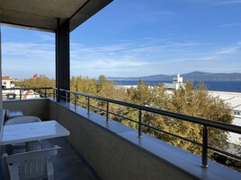 Deluxe Triple Room, Balcony, Sea View | Hypo-allergenic bedding, minibar, in-room safe, laptop workspace