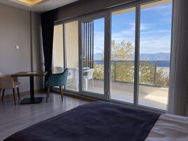 Deluxe Triple Room, Balcony, Sea View | Balcony