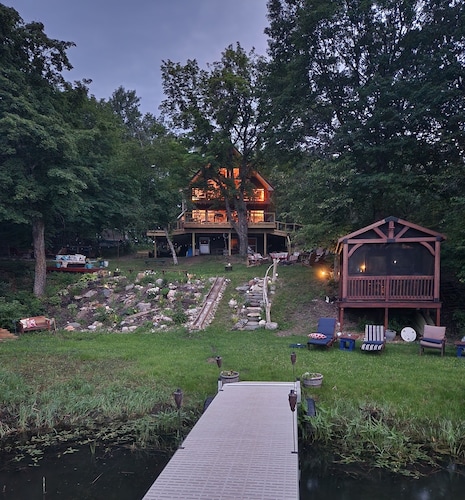Pet and family friendly, Private lake, with private sandy beach.  Five bedroom.