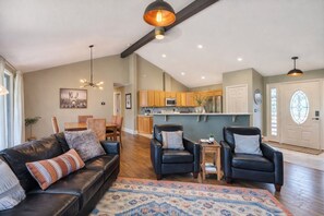 Smart TV, fireplace, books, computer monitors