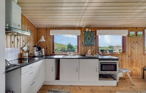 Fridge, stovetop, coffee/tea maker