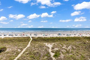 On the beach, sun-loungers, beach towels