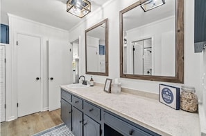 King bathroom sink area is separate from shower/toilet area for added privacy - Relaxed Beach Cottage, Steps to Sand, Near 30A & Pier Park (Panama City Beach)