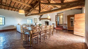 A rustic dining area with wooden furniture and exposed beams. - Awesome home in Castellina in Chianti (Castellina in Chianti)