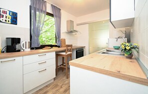 Fridge, microwave, dishwasher, coffee/tea maker