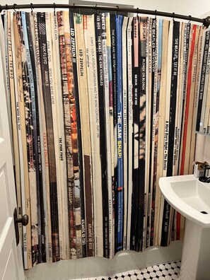 Combined shower/tub, hair dryer, towels, soap