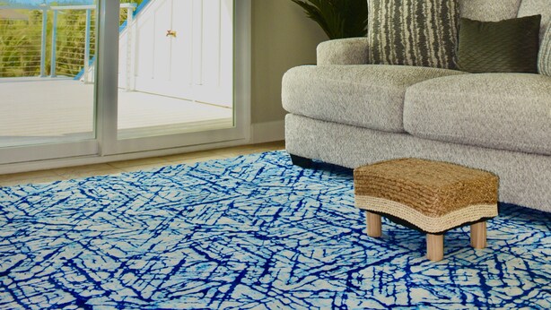 A living room with a large window, a couch, a rug, and a painting of a turtle. - Luxury Island Escape @ Palm Tree Villa: Private Rooftop Deck & Saltwater Pool (Bookelia)