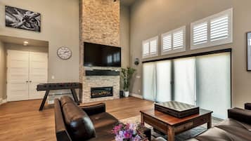 Smart TV, fireplace, foosball, stereo