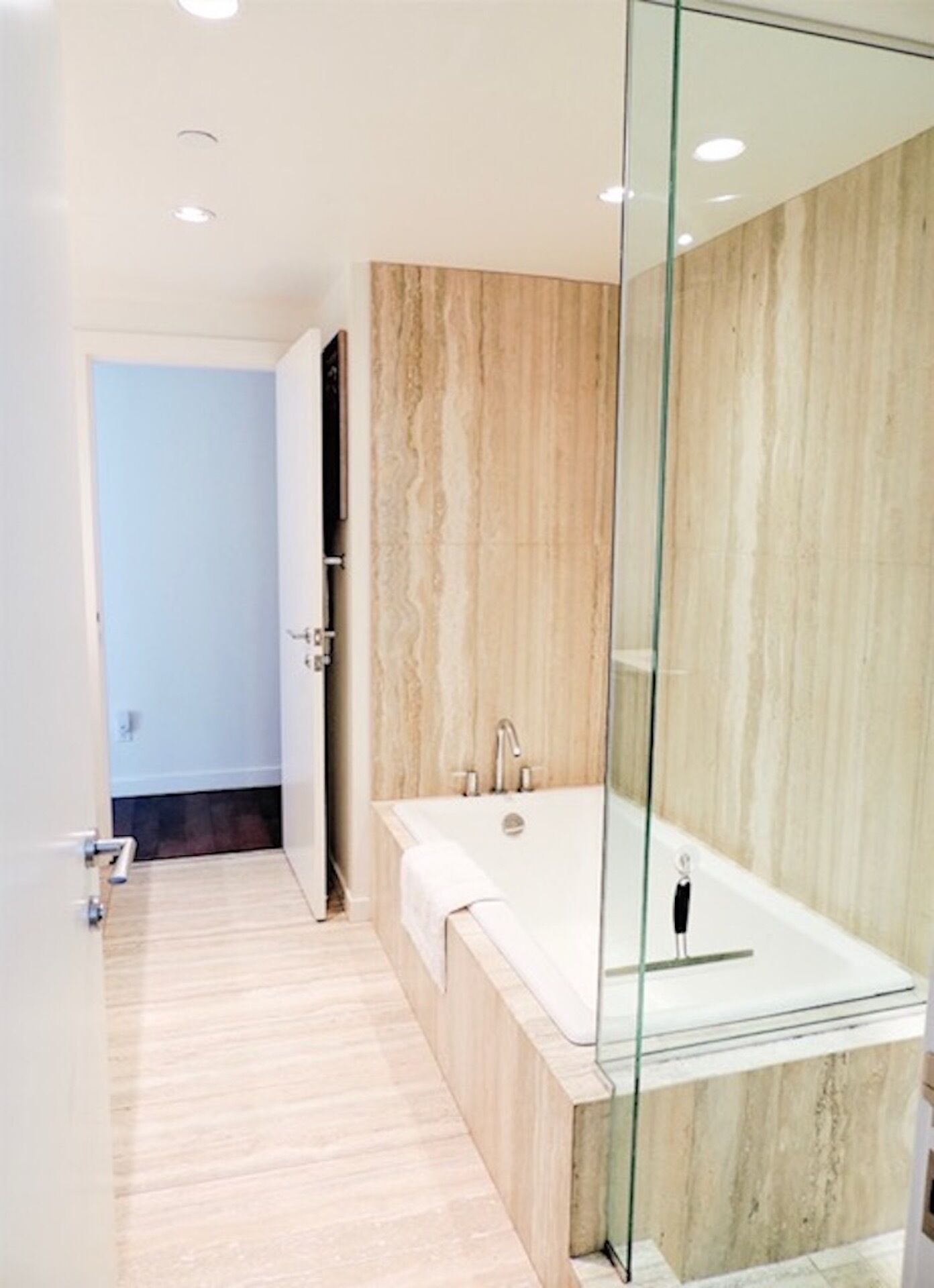 Bathtub, hair dryer, towels, soap