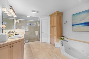 Bathtub, jetted tub, hair dryer, towels