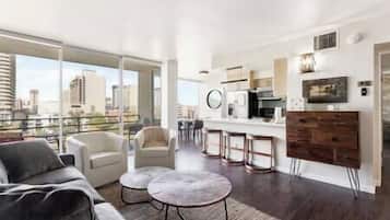 TV, fireplace, books