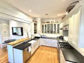 Fridge, microwave, oven, stovetop - Deluxe Downtown Bungalow - fenced in yard, pet friendly. (Brevard)