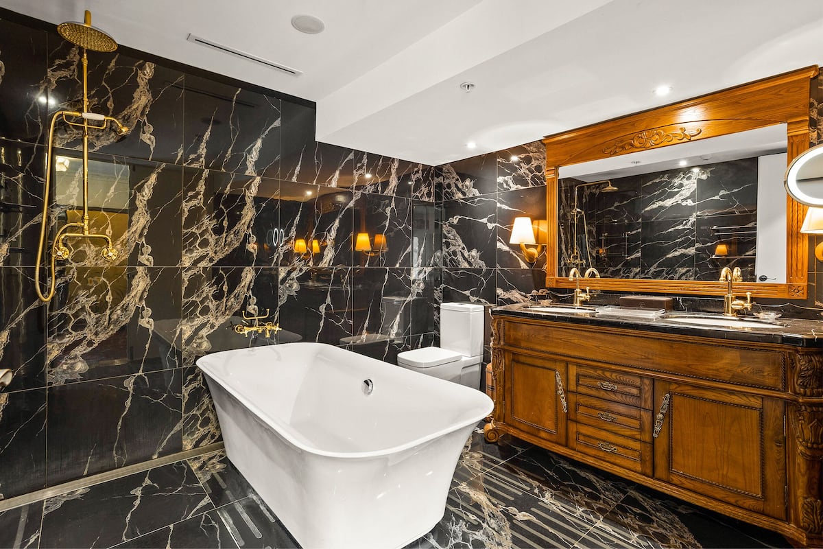 Designer toiletries, hair dryer, towels, soap