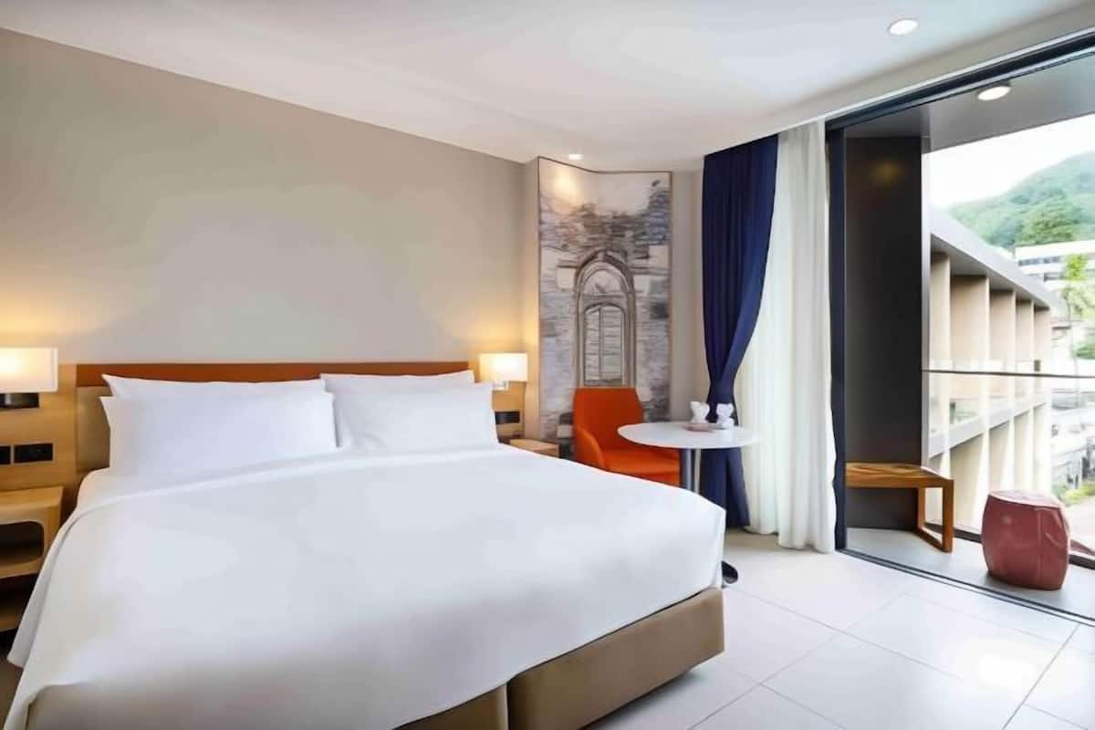 In-room safe, laptop workspace, blackout drapes, soundproofing
