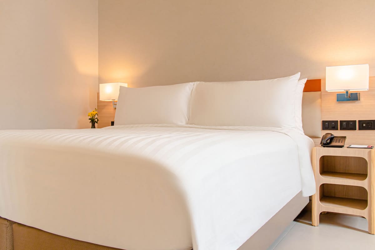 In-room safe, laptop workspace, blackout drapes, soundproofing