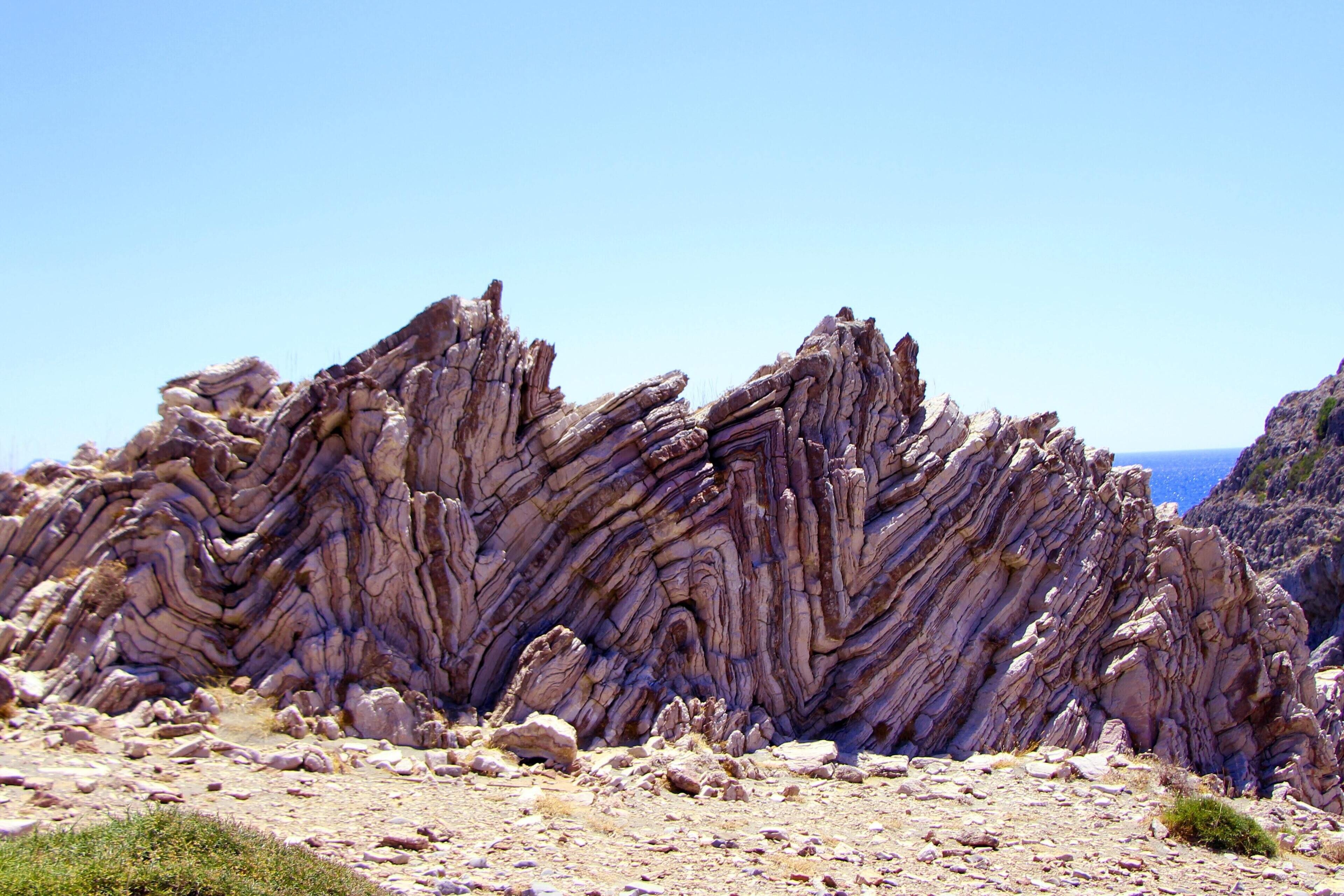 A rocky landscape with layered rock formations.