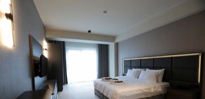 Minibar, desk, iron/ironing board
