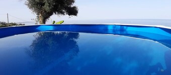 Villa Aliaksandra swimming pool and garden in Tricase Porto. In front of the sea