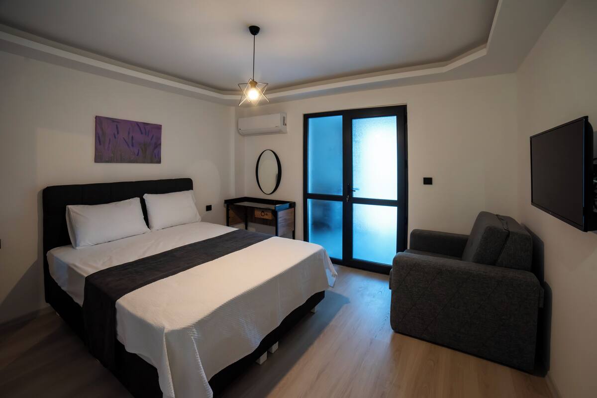 Junior-suite - balkon - havudsigt | 2 soveværelser, minibar, gratis Wi-Fi, sengetøj
