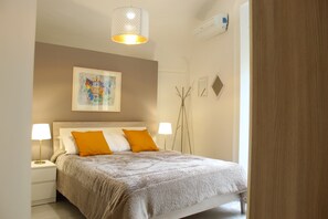 1 chambre, coffres-forts dans les chambres, fer et planche à repasser