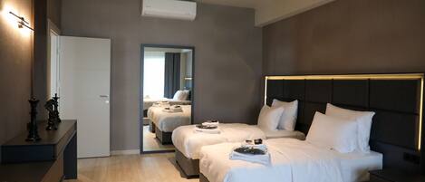 家庭套房, 1 间卧室 | 埃及棉床单、高档床上用品、泰普尔床垫、迷你吧