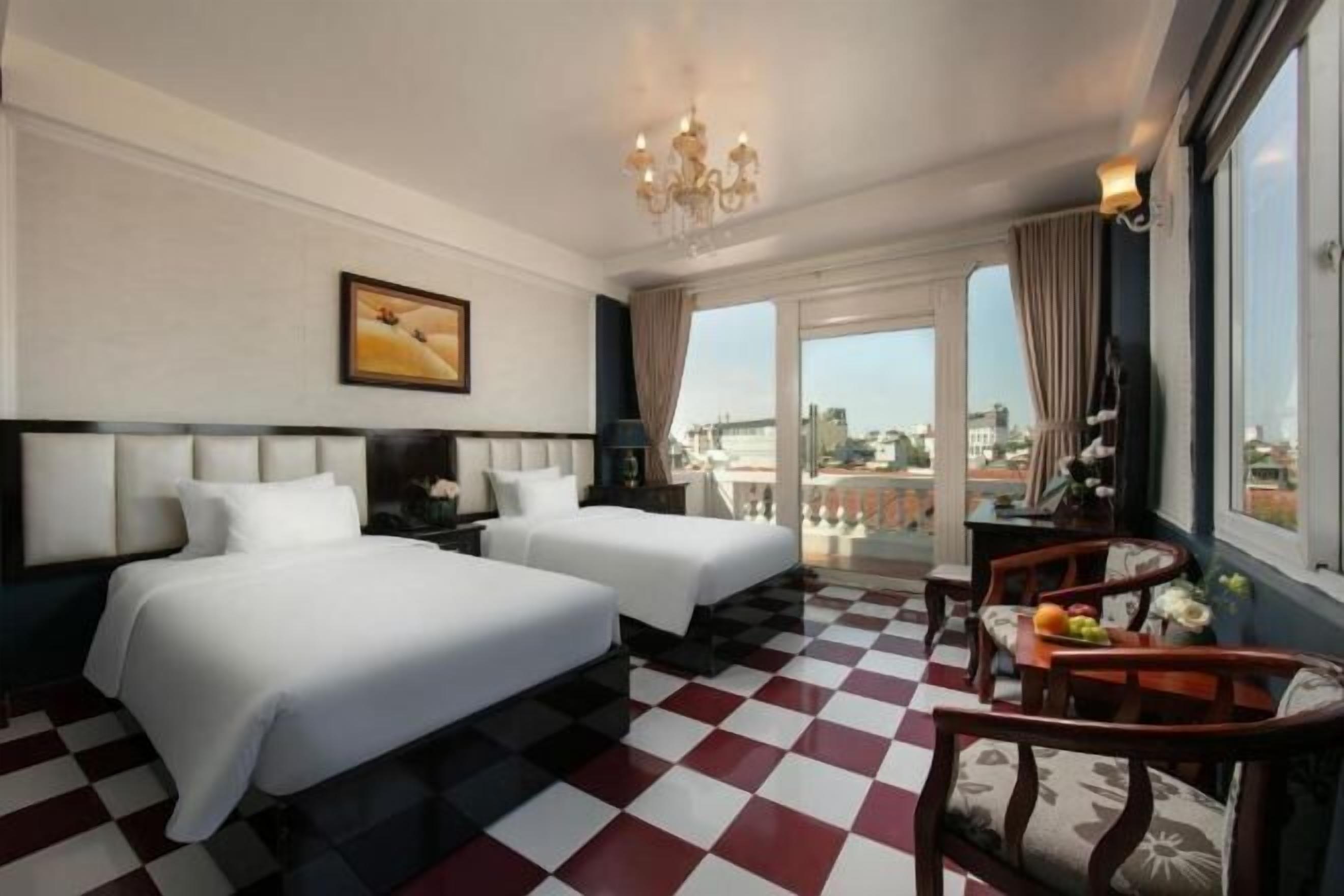 Premium bedding, pillow-top beds, desk, laptop workspace