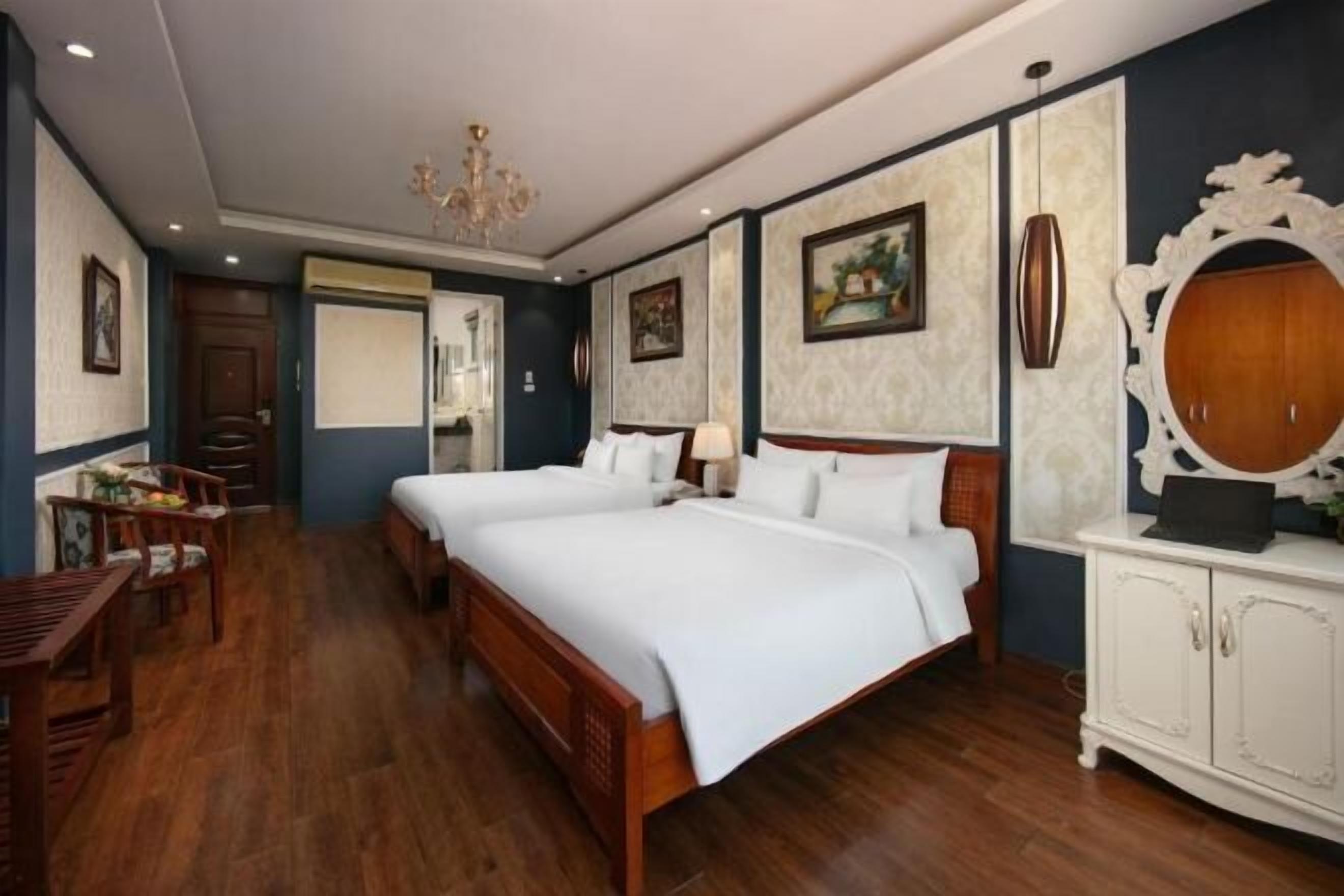 Premium bedding, pillow-top beds, desk, laptop workspace