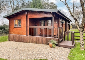 Exterior, Outside - Four berth lodge with one master double and one twin each with wardrobe. (Crewkerne)