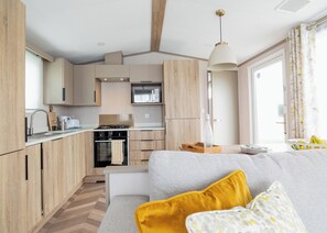 Fridge, oven, stovetop, toaster - Modern, stylish and spacious 12ft-wide caravan with one double and one twin. (Selsey, Chichester)