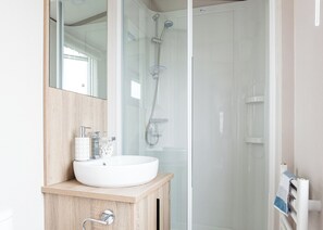 Bathroom - Modern, stylish and spacious 12ft-wide caravan with one double and one twin. (Selsey, Chichester)