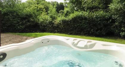 Stunning well-equipped lodge set in mature and beautiful gardens.