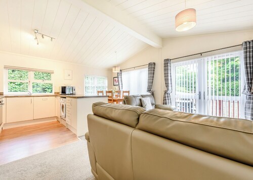 Stunning well-equipped lodge set in mature and beautiful gardens.