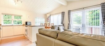 Stunning well-equipped lodge set in mature and beautiful gardens.