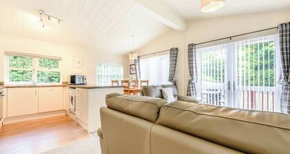 Stunning well-equipped lodge set in mature and beautiful gardens.